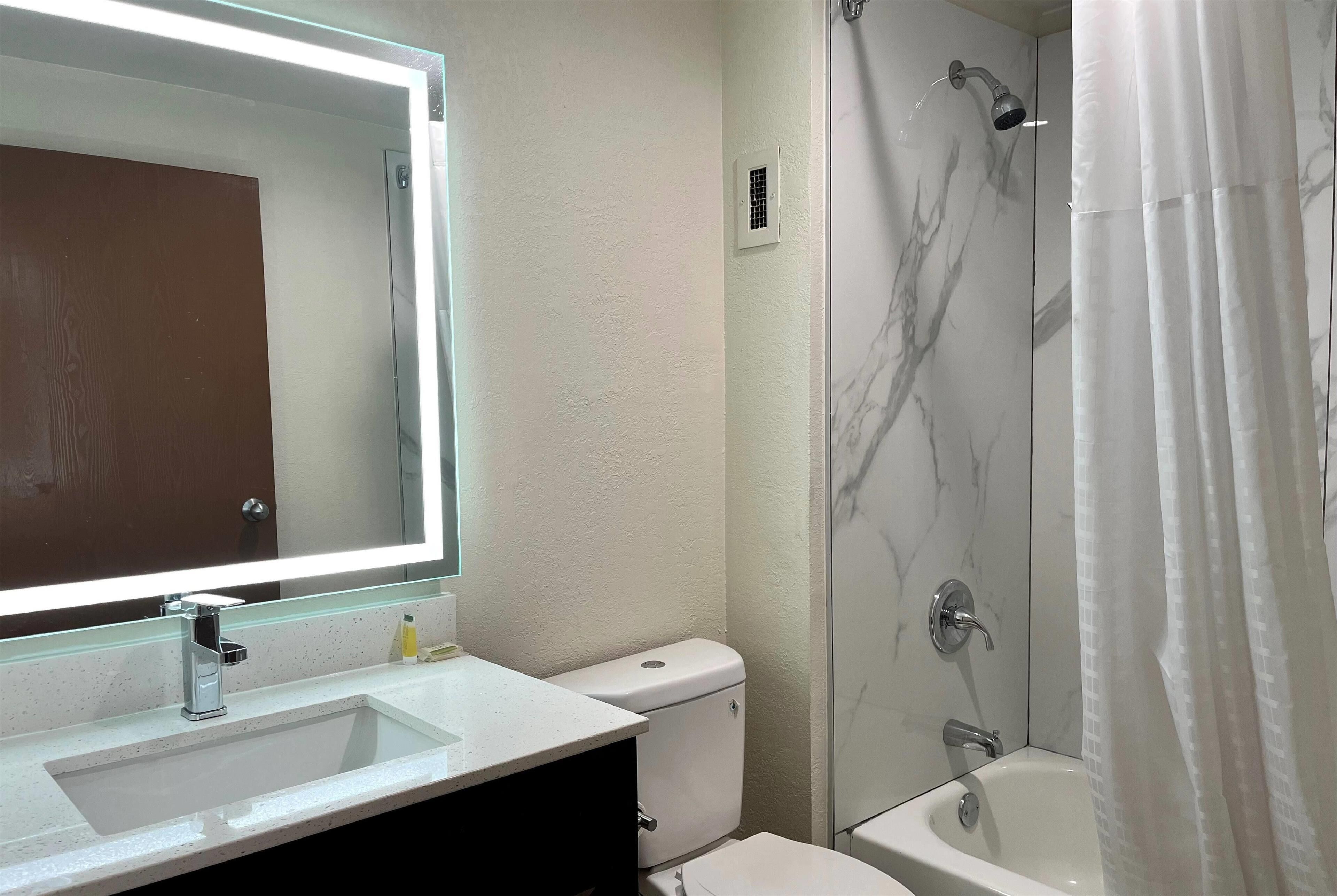 Combined shower/bathtub, eco-friendly toiletries, hair dryer, towels