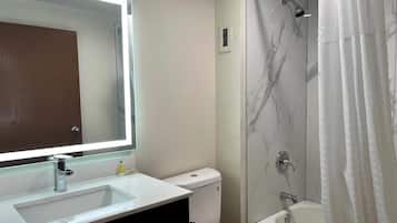 Combined shower/bathtub, eco-friendly toiletries, hair dryer, towels
