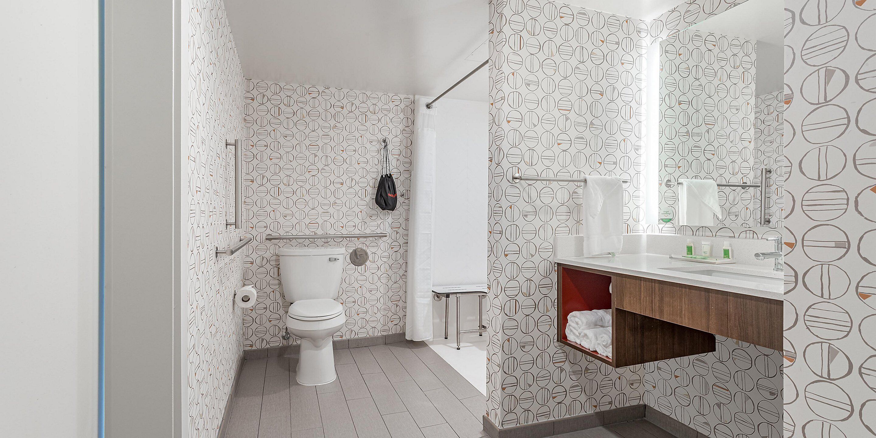 eco-friendly toiletries, hair dryer, towels