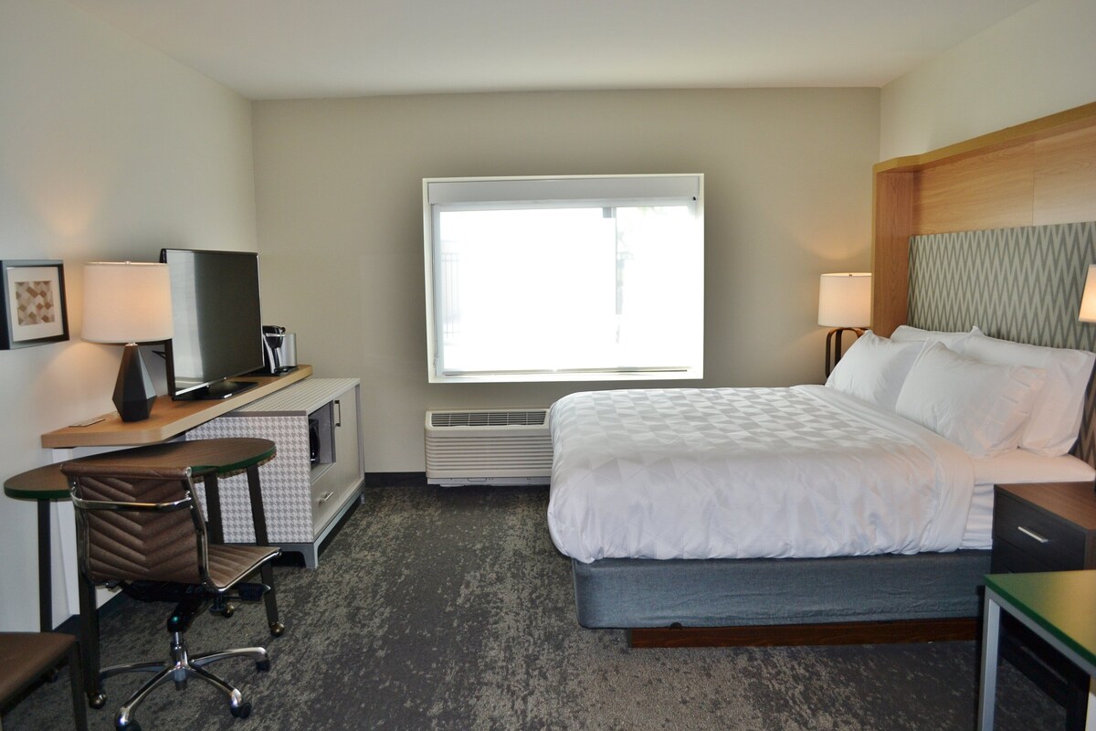 Desk, laptop workspace, blackout curtains, iron/ironing board