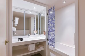 Designer toiletries, hair dryer, towels, soap