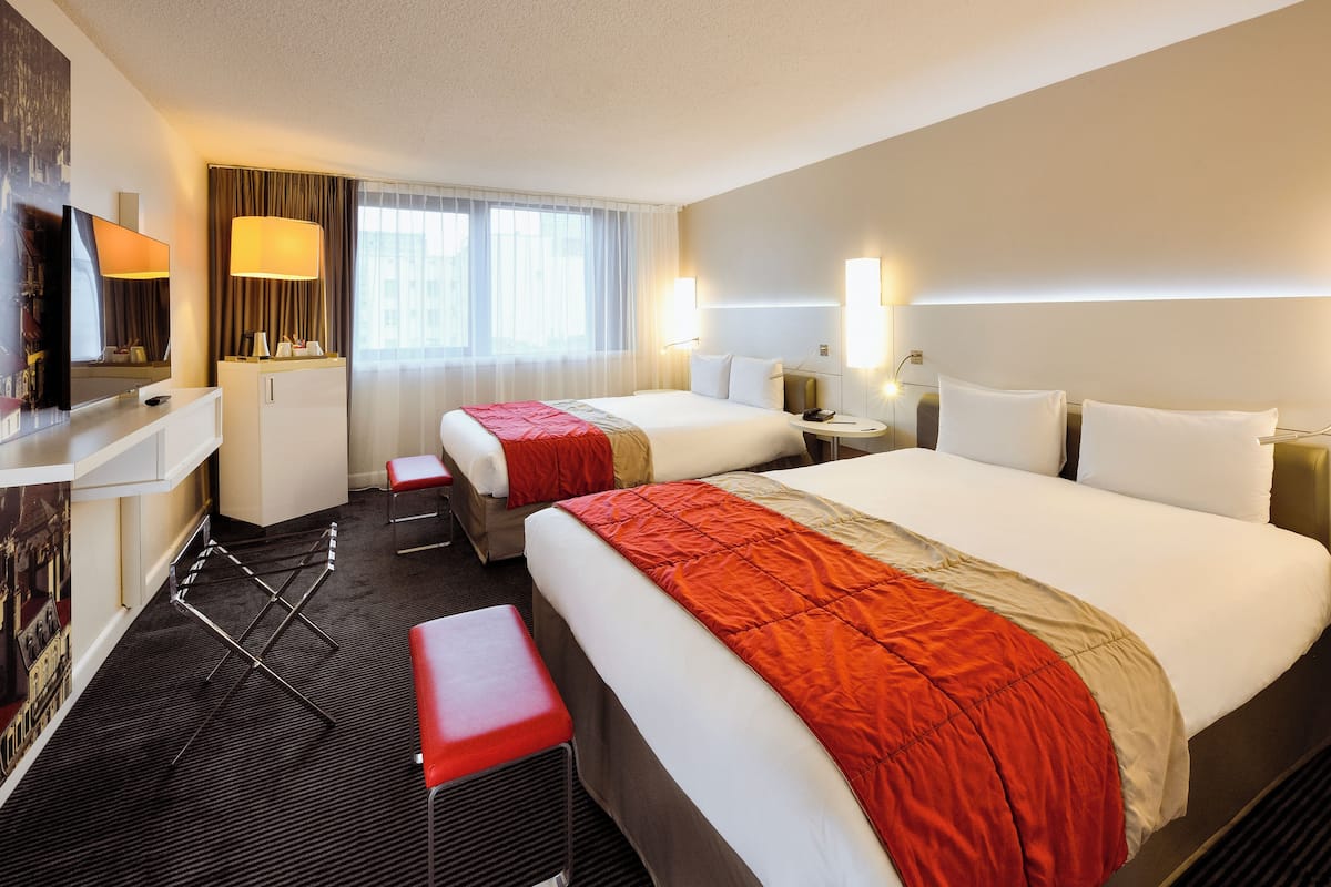 Premium bedding, memory foam beds, in-room safe, laptop workspace