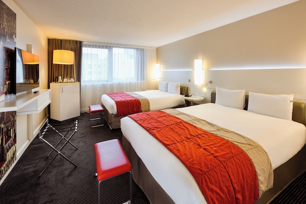 Premium bedding, memory-foam beds, in-room safe, laptop workspace