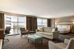 Studio, 1 King Bed with Sofa bed | Living area | 55-inch TV with digital channels, MP3 dock