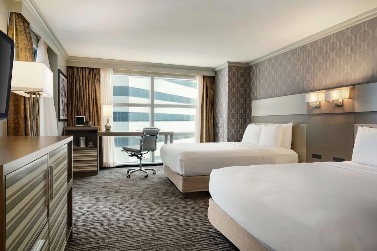 room, 2 queen beds, non smoking, balcony | hypo-allergenic bedding, in-room safe, desk, laptop workspace