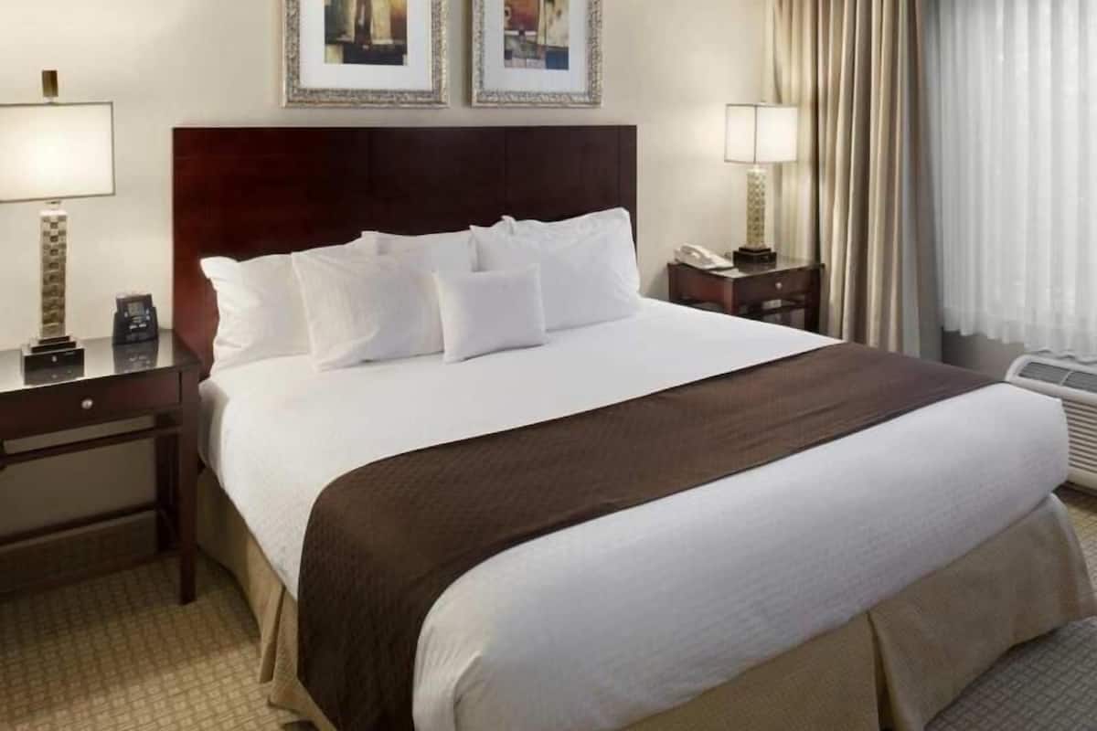 In-room safe, desk, laptop workspace, blackout curtains