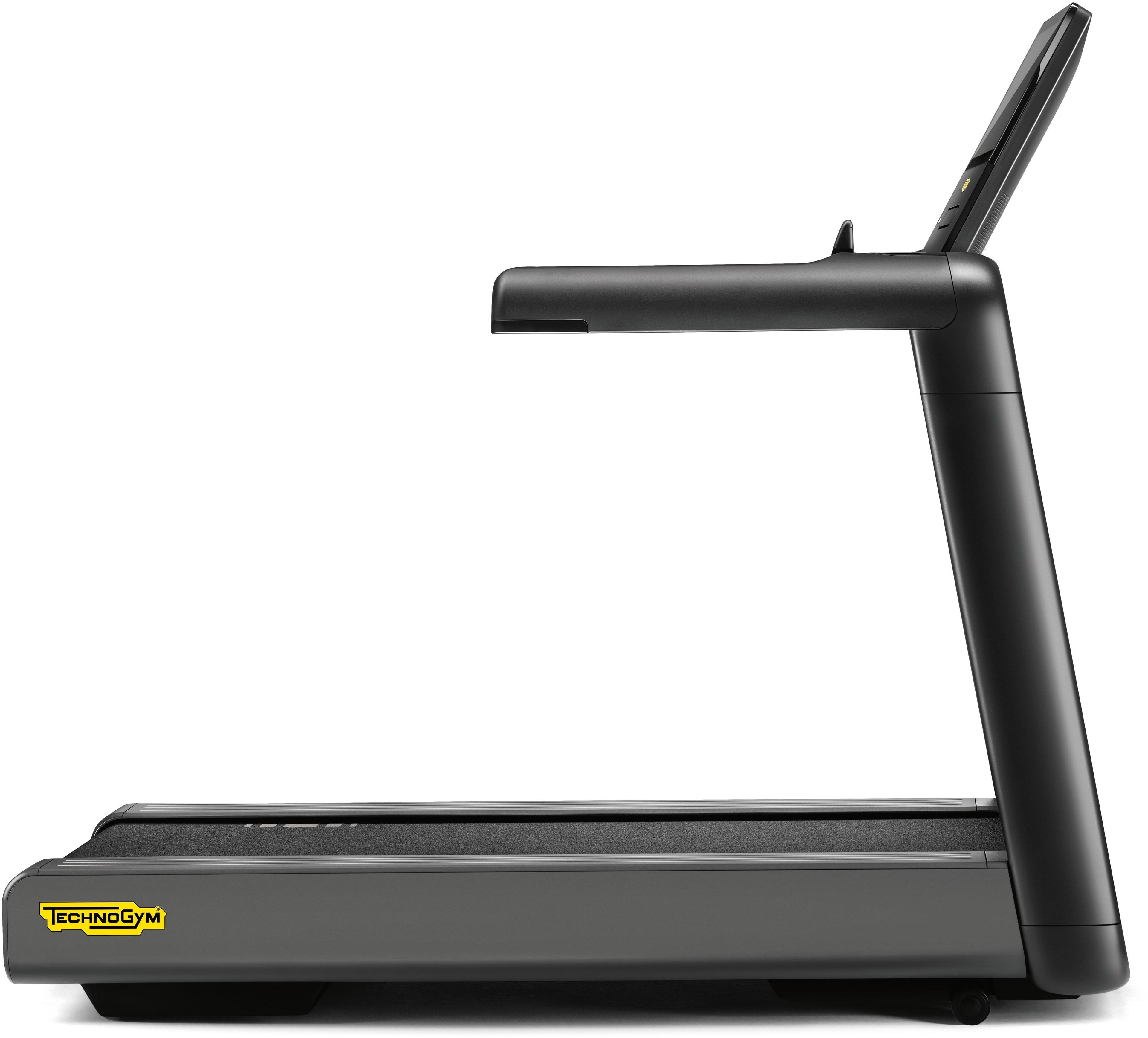 A black treadmill with a control panel and a digital display.