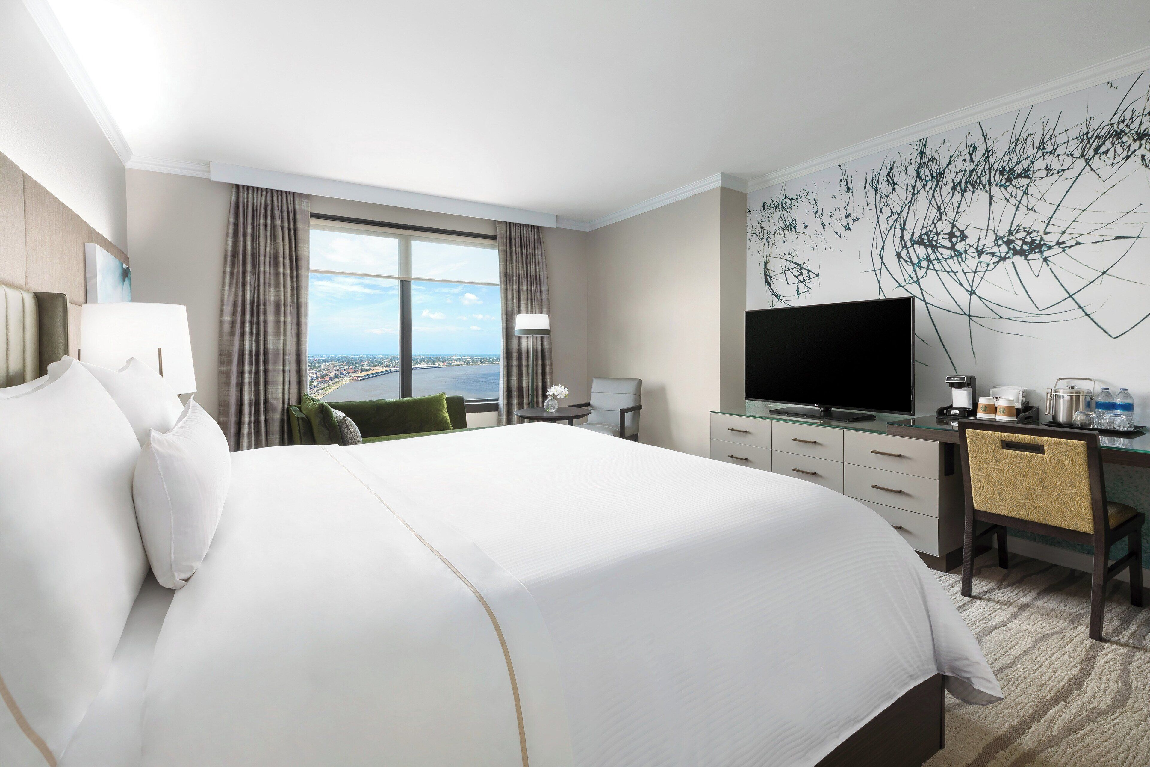 Deluxe kamer, 1 kingsize bed, uitzicht op rivier | Luxe beddengoed, pillowtop-bedden, een kluis op de kamer, een bureau
