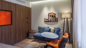 Deluxe Room with Double Bed or Two Single Beds and Wellness Area Access | Living area | 40-inch flat-screen TV with satellite channels, TV