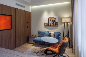 Deluxe Room with Double Bed or Two Single Beds and Wellness Area Access | Living area | 40-inch flat-screen TV with satellite channels, TV