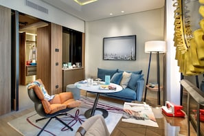 Deluxe Room with Double Bed or Two Single Beds and Wellness Area Access | Living area | 40-inch flat-screen TV with satellite channels, TV - Hotel Cavour (Milan)