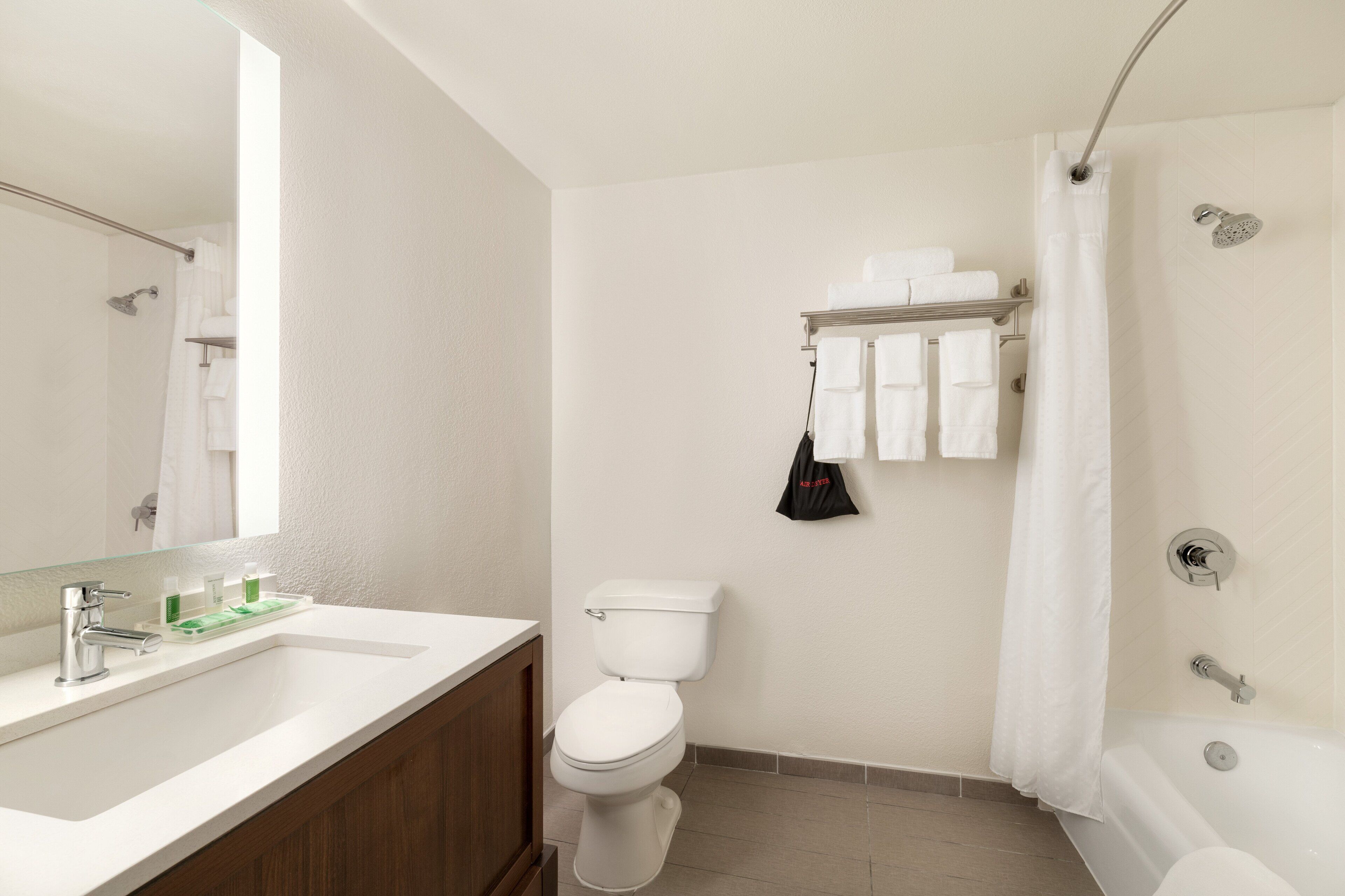 combined shower/bathtub, free toiletries, hair dryer, towels