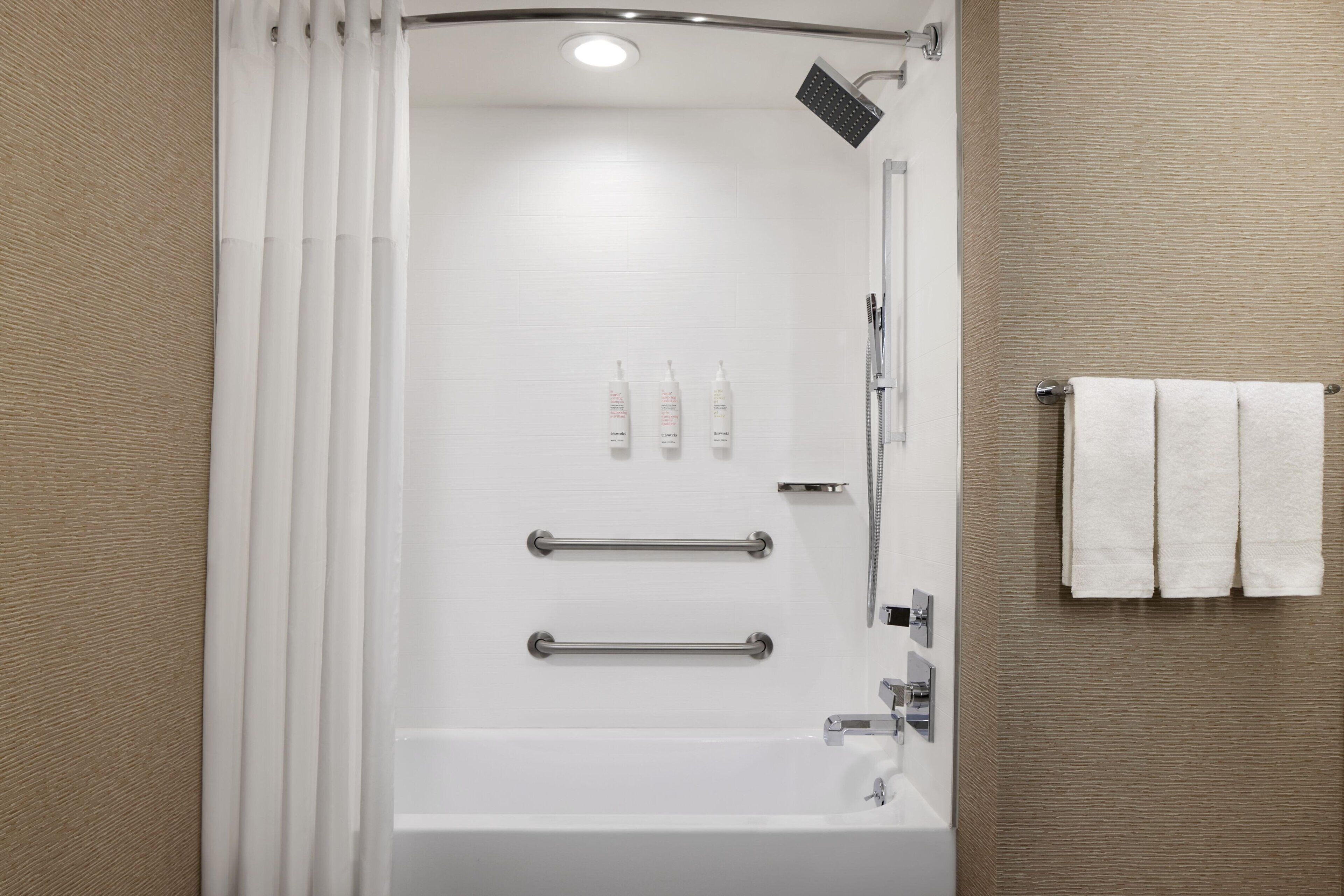 Eco-friendly toiletries, hair dryer, towels, soap