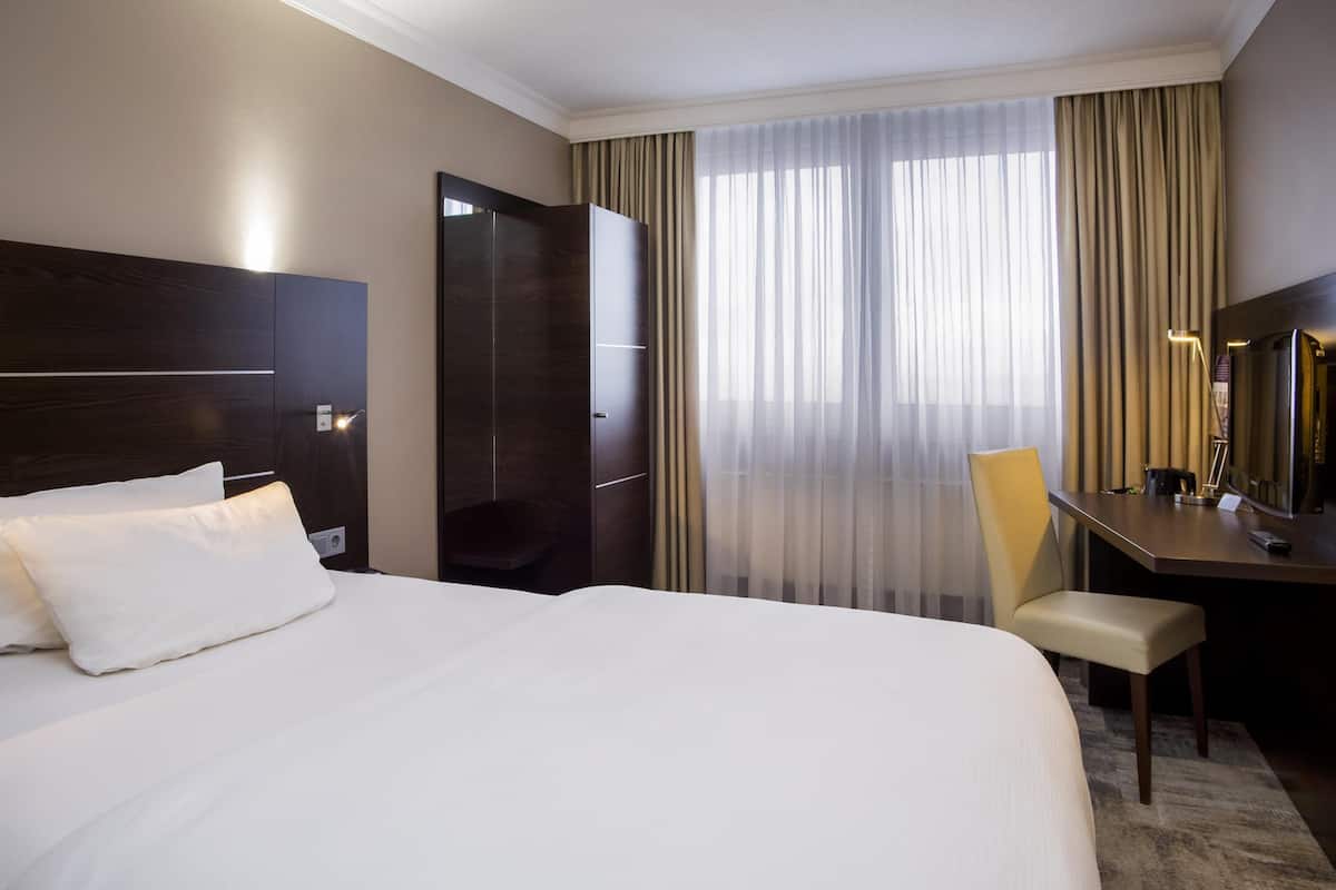 Habitación estándar, 1 cama individual | Ropa de cama hipoalergénica, escritorio y cortinas blackout