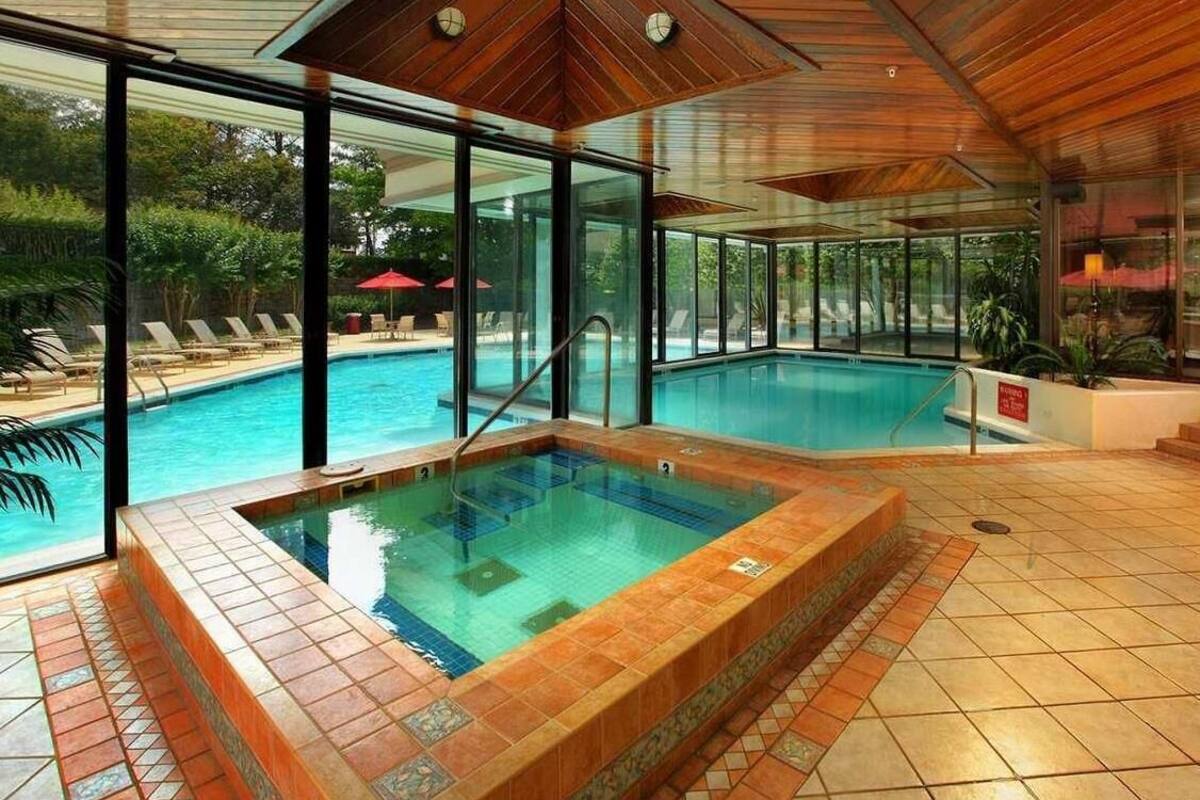 Pool | Indoor pool, outdoor pool, open 7:00 AM to 10:00 PM, pool umbrellas