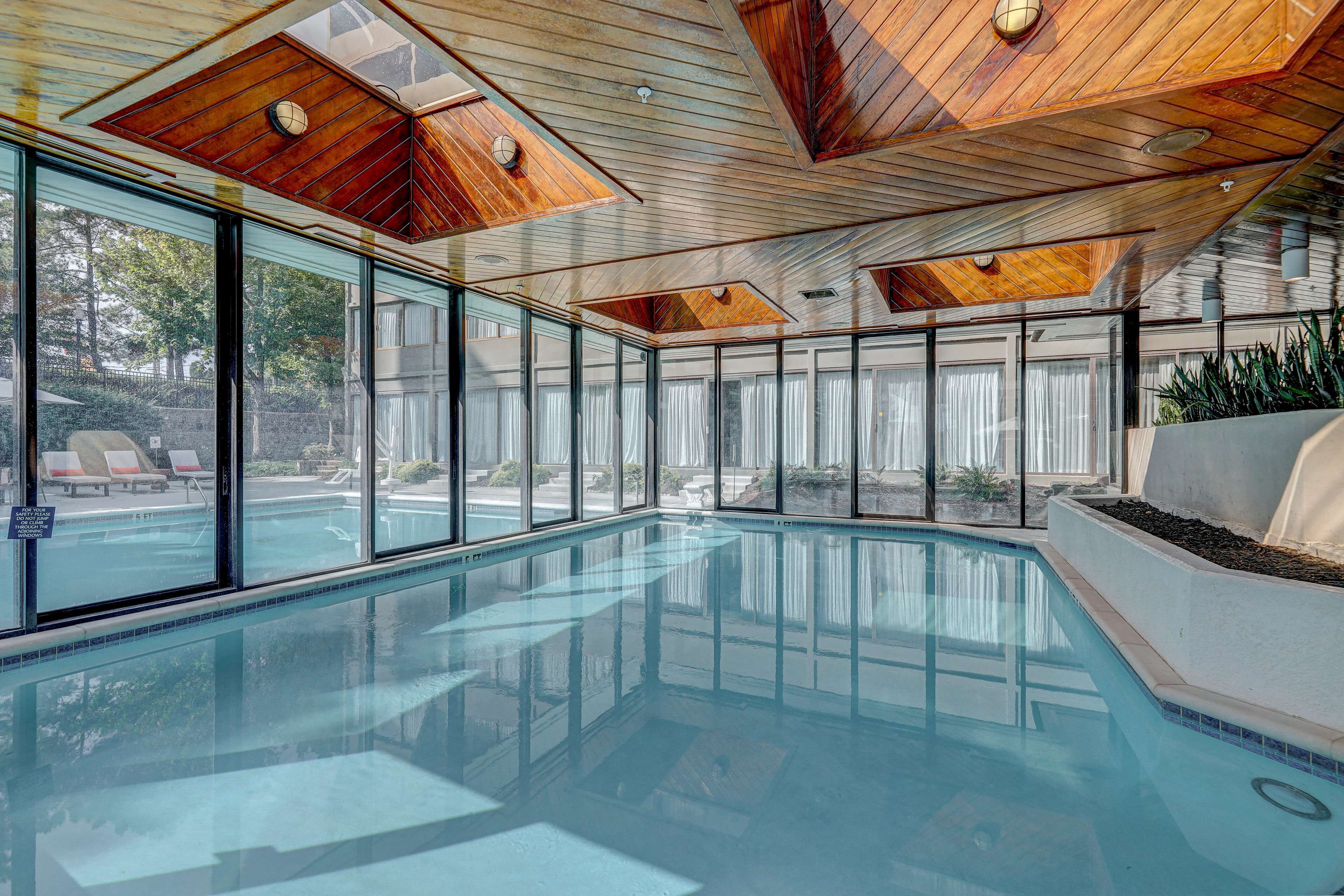 indoor pool, outdoor pool, open 7:00 am to 10:00 pm, pool umbrellas