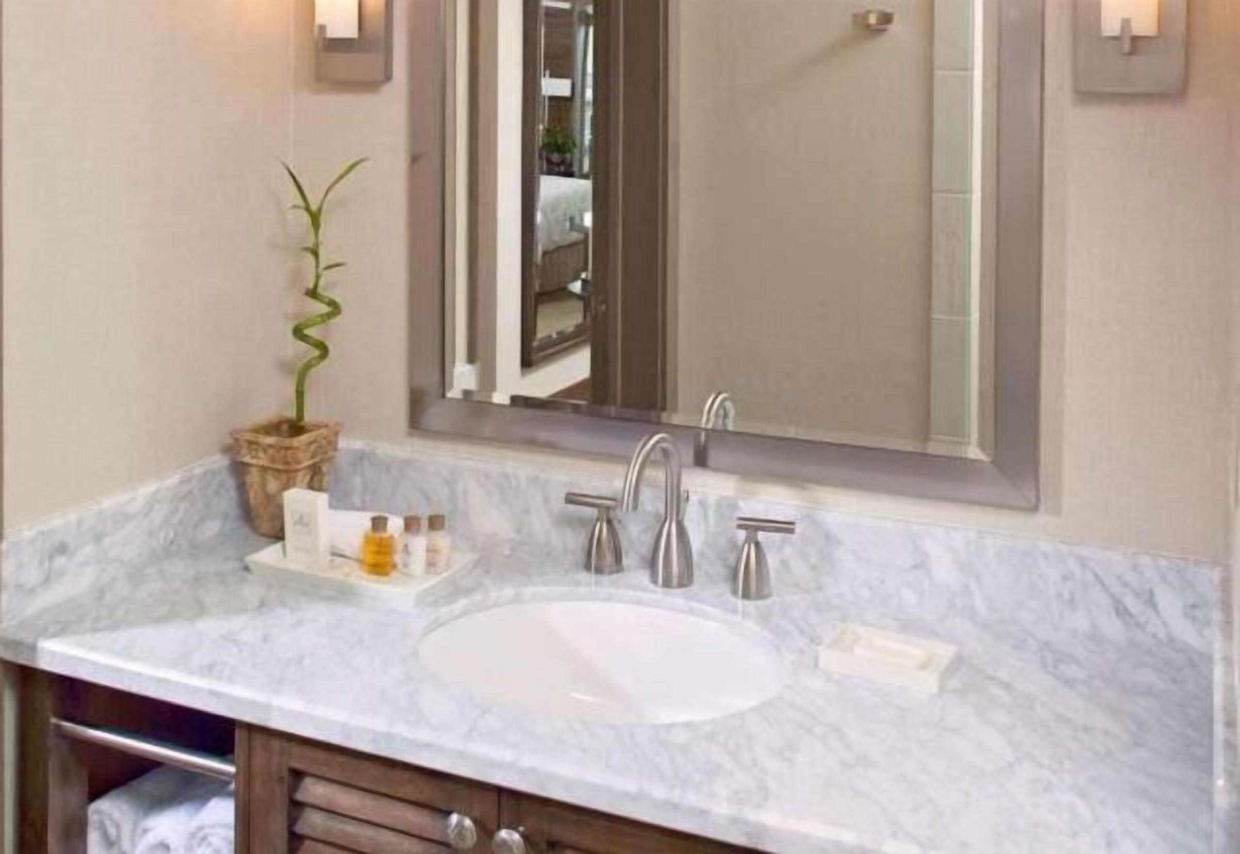 Eco-friendly toiletries, hair dryer, towels, soap