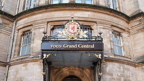 The entrance of the Voco Grand Central building with a prominent sign and ornate architectural details. - voco Grand Central Glasgow by IHG (Glasgow)
