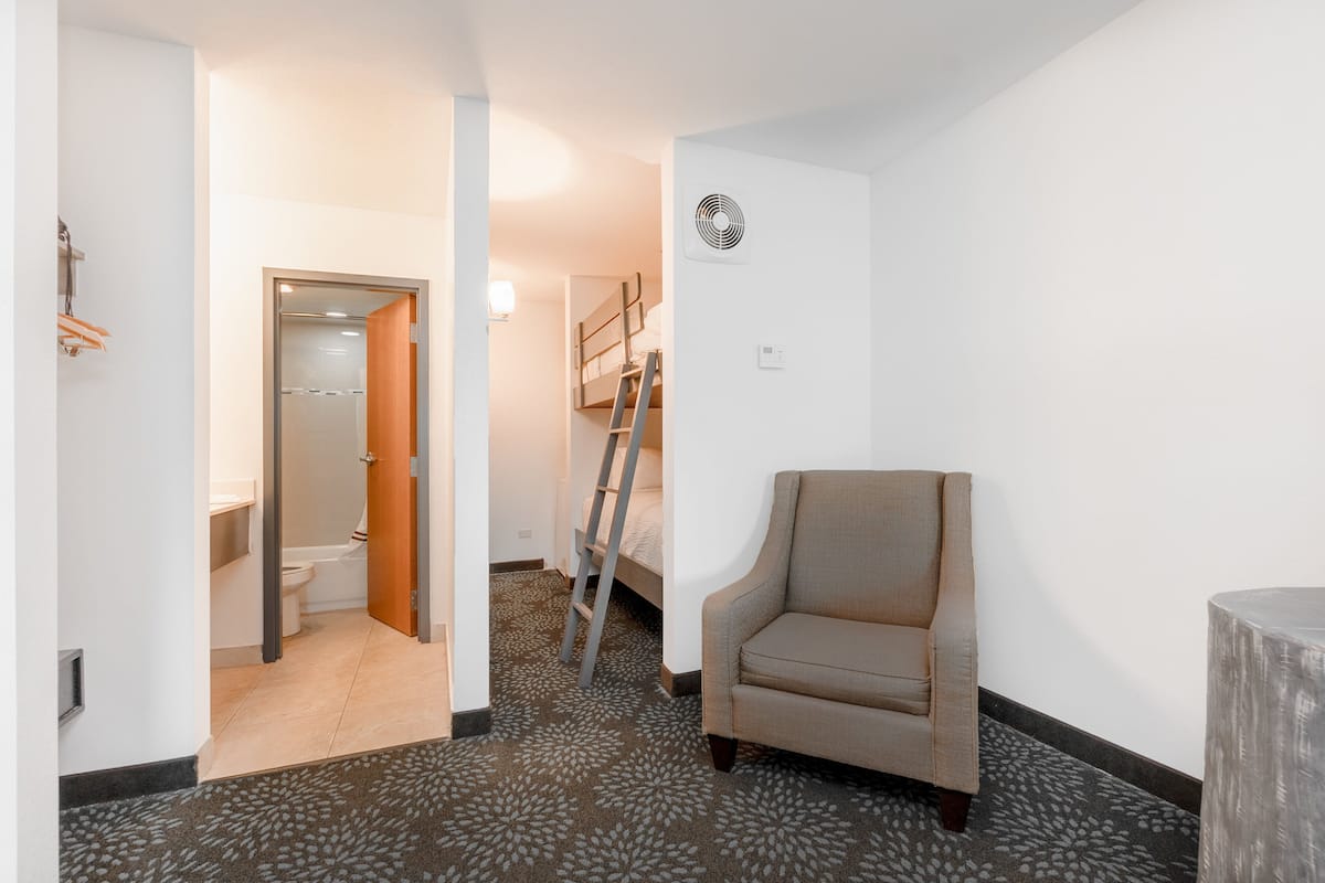 Suite, 1 Bedroom | 1 bedroom, in-room safe, desk, iron/ironing board