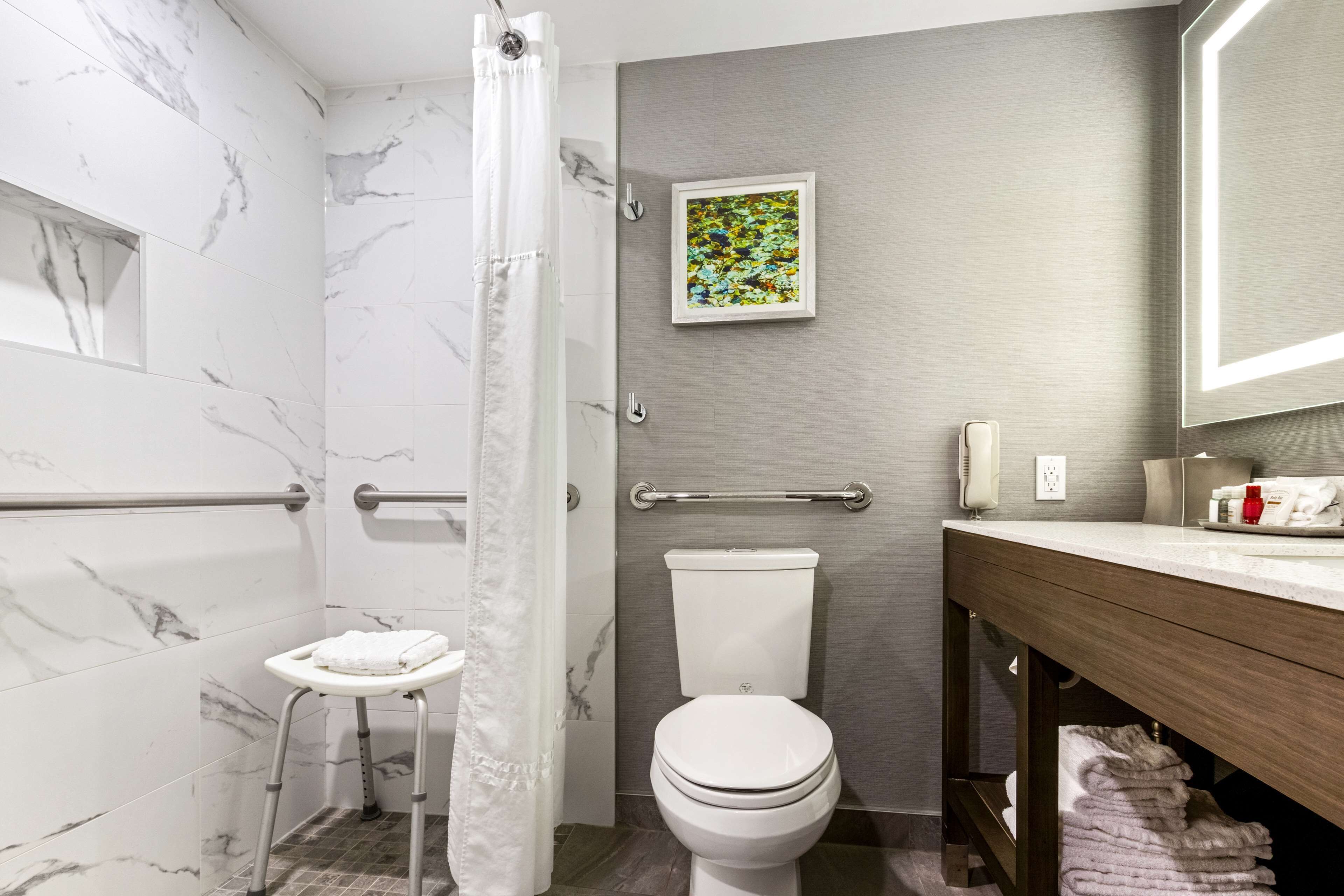 eco-friendly toiletries, hair dryer, towels, soap