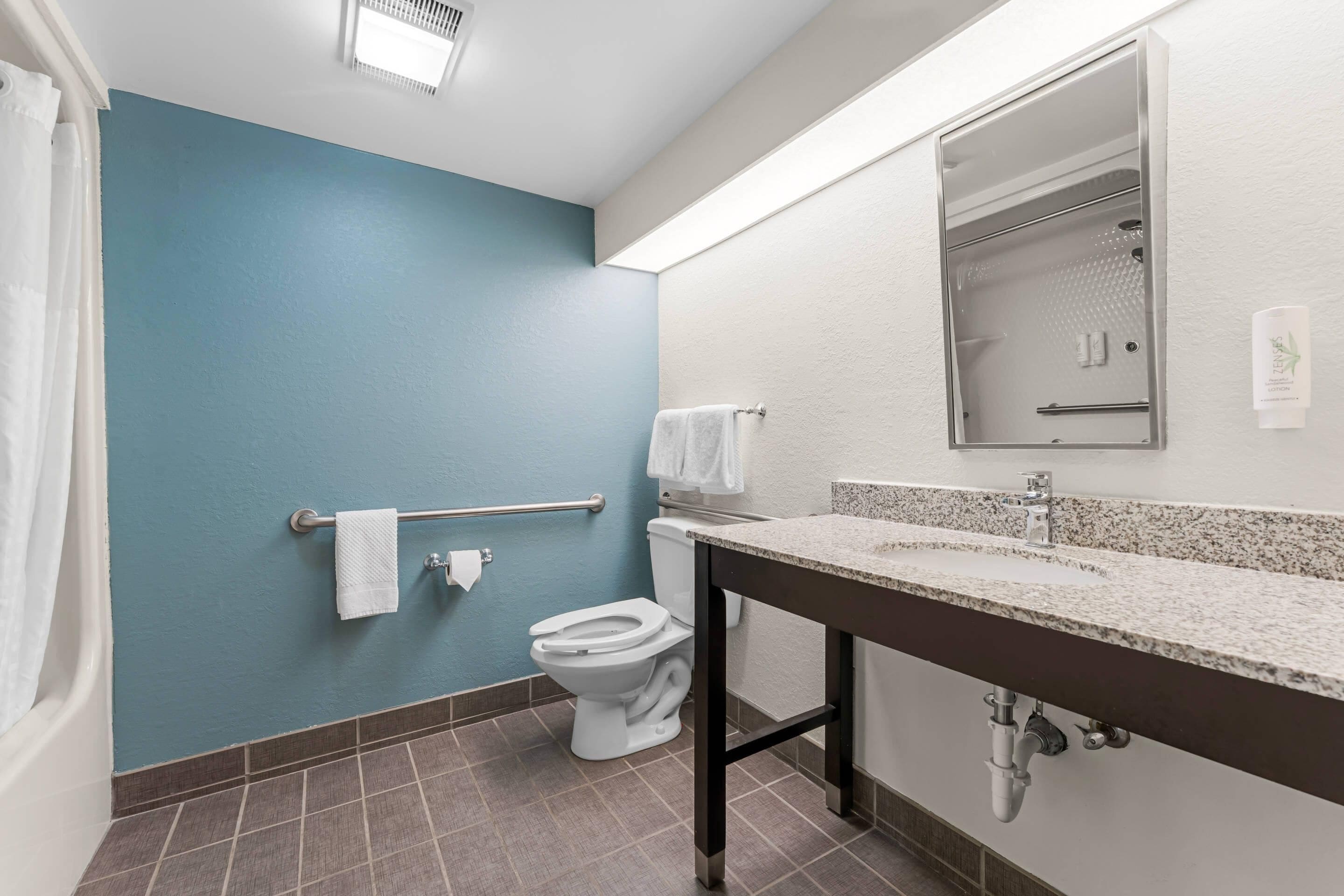 Shower, eco-friendly toiletries, hair dryer, towels