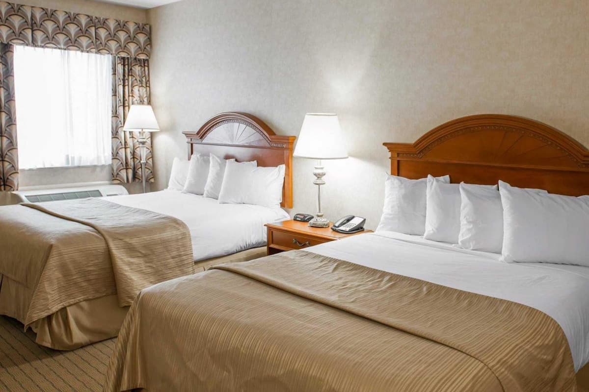Premium bedding, pillowtop beds, desk, blackout drapes