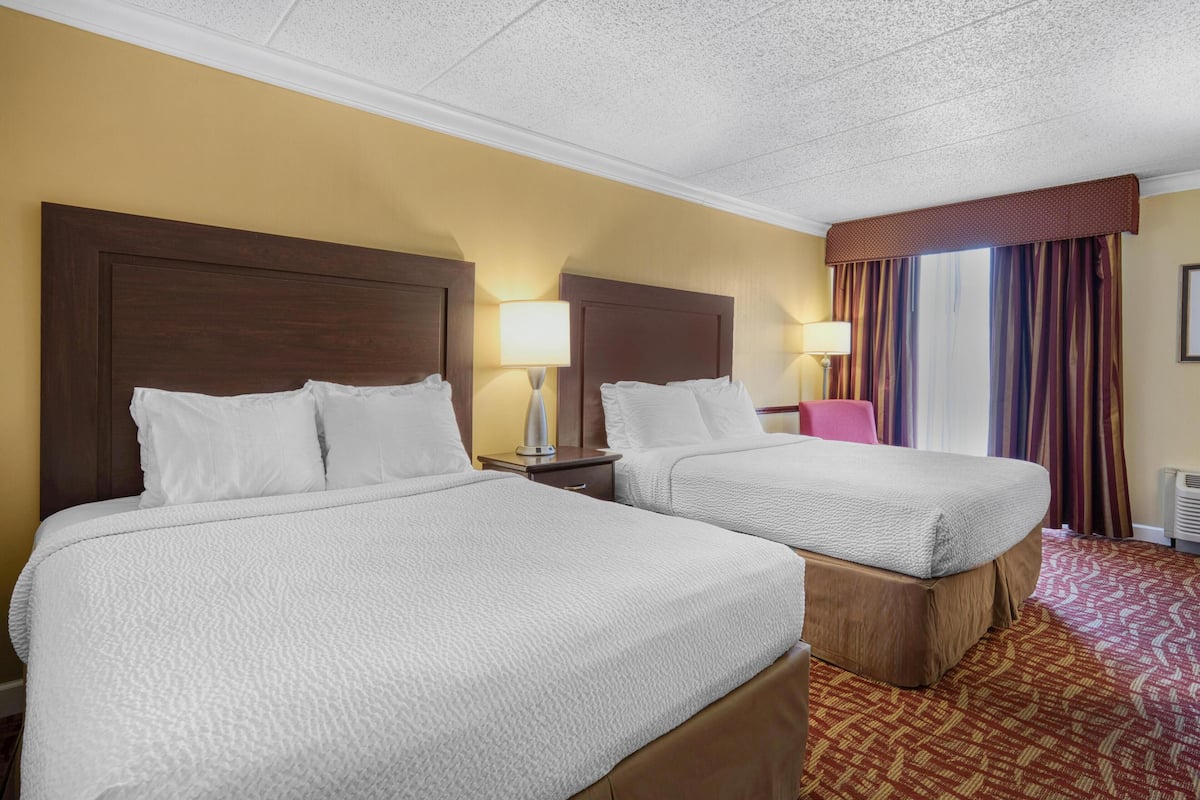 Premium bedding, pillowtop beds, desk, laptop workspace