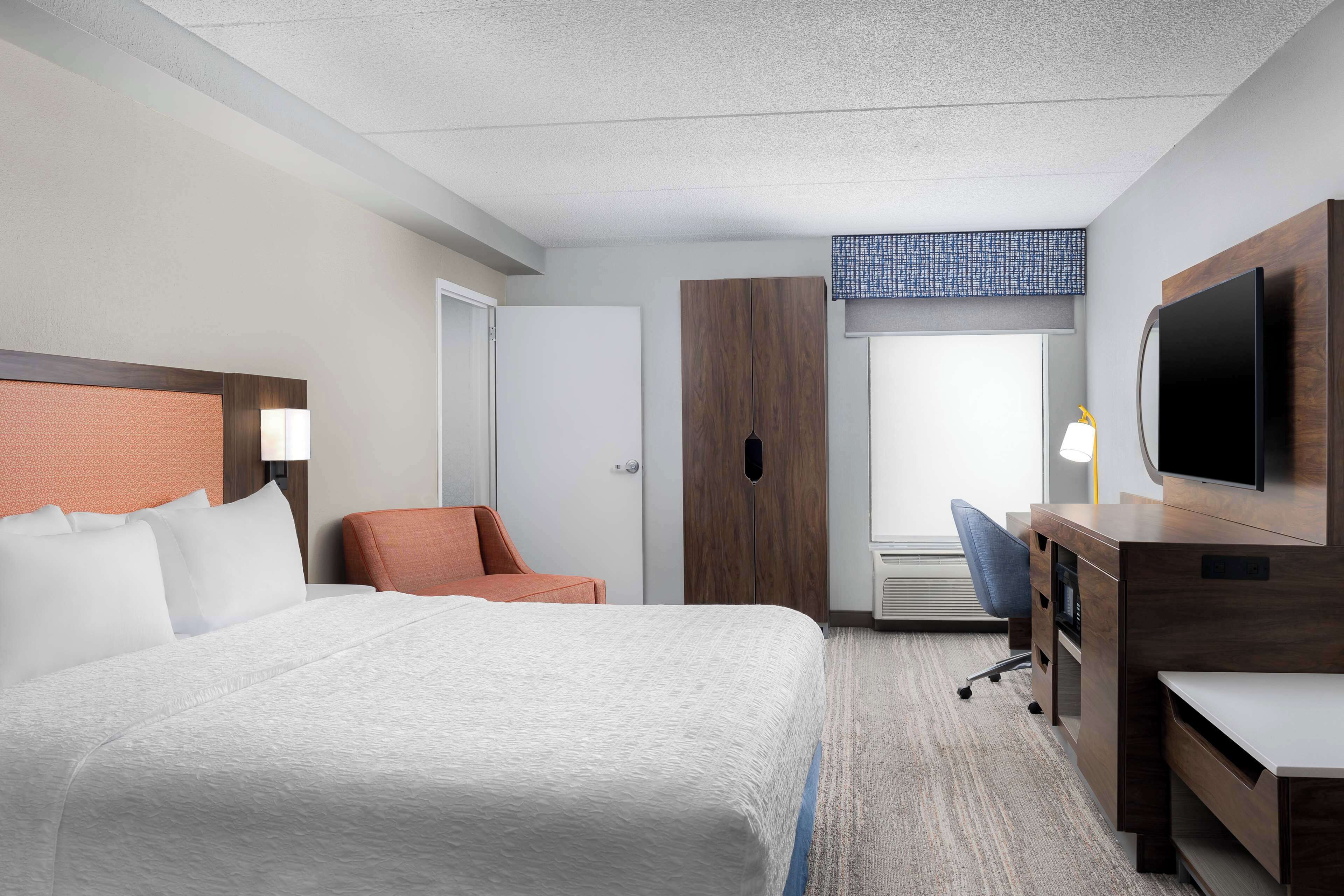 premium bedding, desk, blackout curtains, iron/ironing board