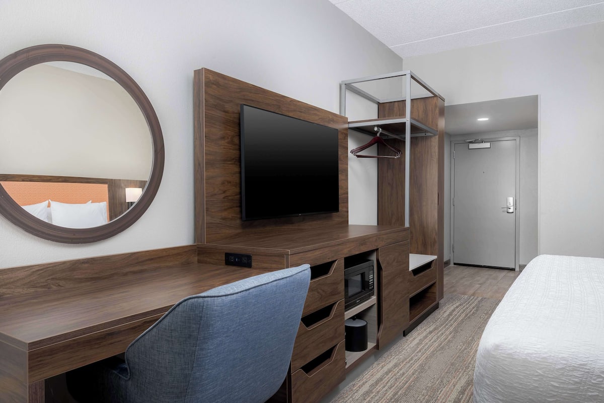 premium bedding, desk, blackout curtains, iron/ironing board