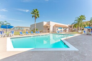 Outdoor pool, pool umbrellas, sun loungers