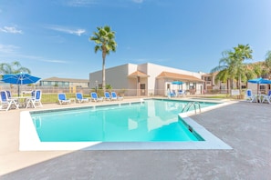 Outdoor pool, pool umbrellas, sun loungers