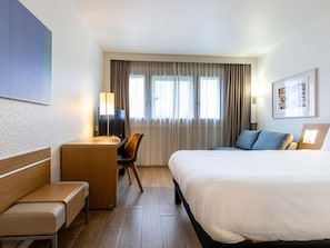 Desk, blackout drapes, soundproofing, iron/ironing board