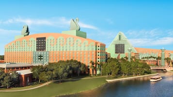 Situated by the water, this hotel features a unique, curved design with a swan sculpture and beautifully manicured grounds.