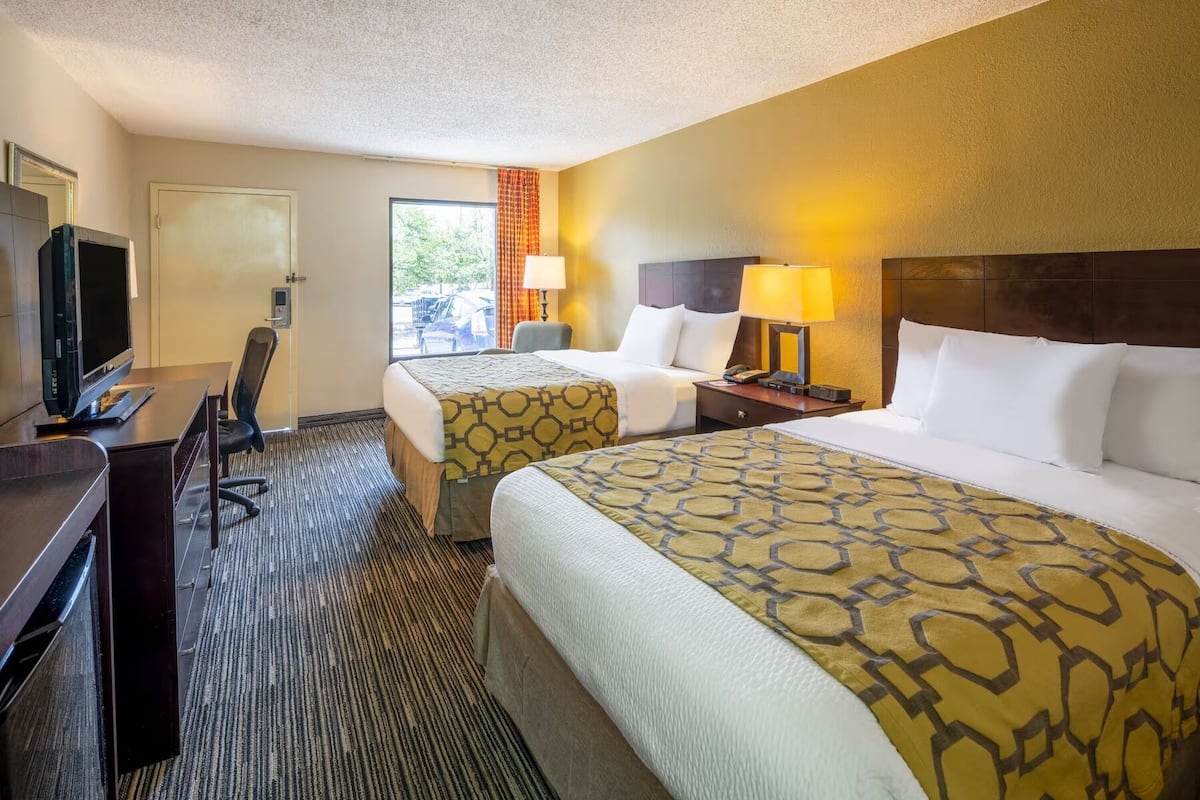 Standard Room, 2 Queen Beds, Non Smoking | Desk, blackout drapes, iron/ironing board, free cribs/infant beds