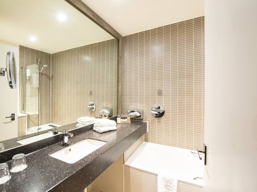 Shower, eco-friendly toiletries, hair dryer, towels