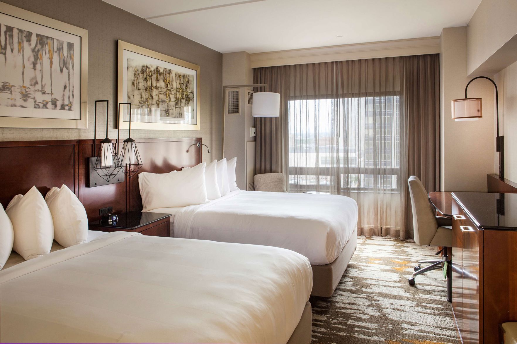 Premium bedding, down comforters, in-room safe, desk