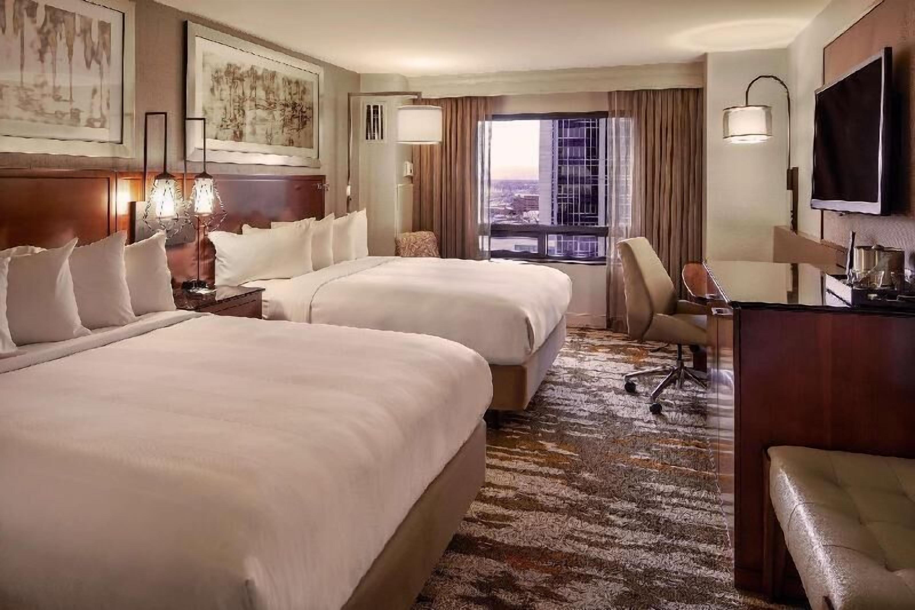 Premium bedding, down comforters, in-room safe, desk