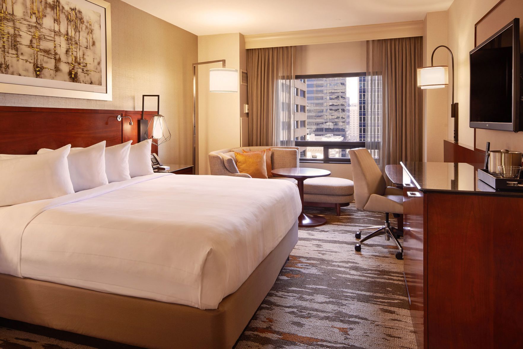 Premium bedding, down comforters, in-room safe, desk