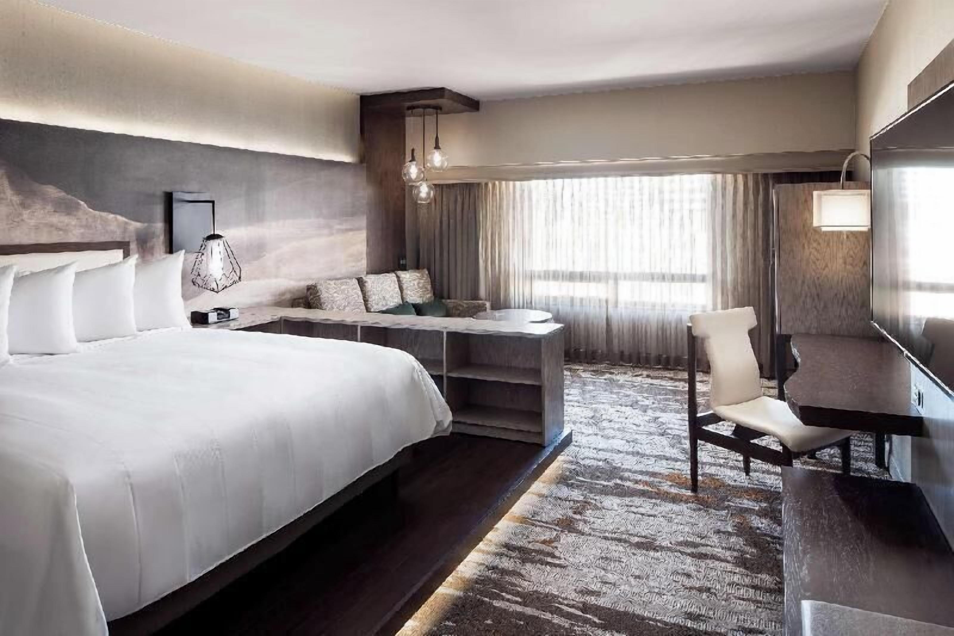 Premium bedding, down comforters, in-room safe, desk