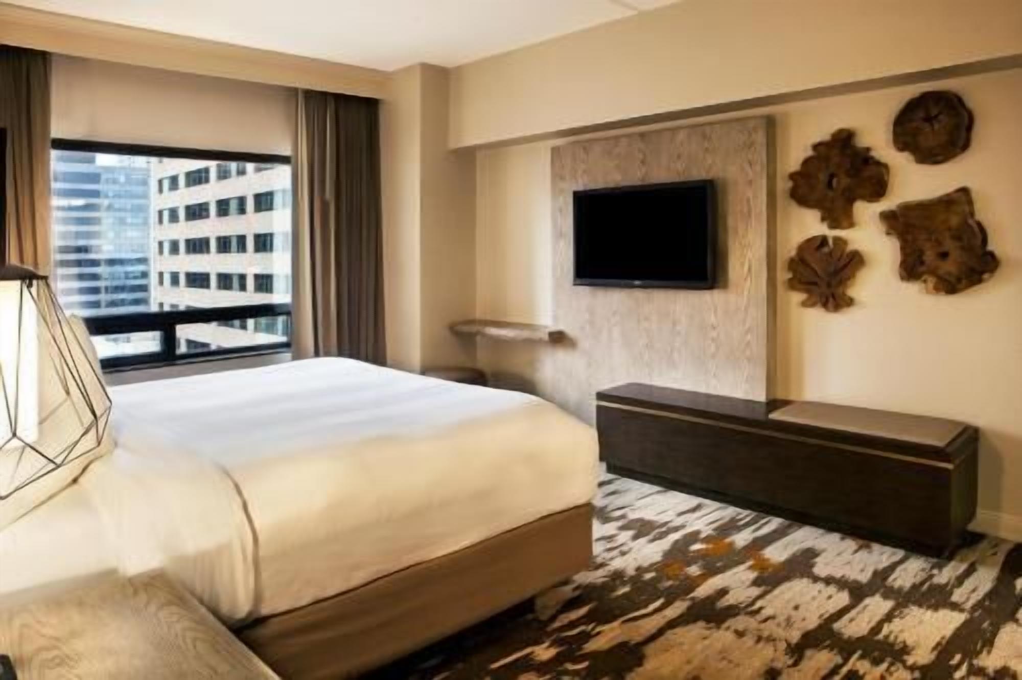 Premium bedding, down comforters, in-room safe, desk