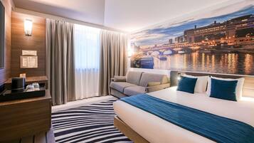 Premium bedding, in-room safe, blackout curtains, soundproofing