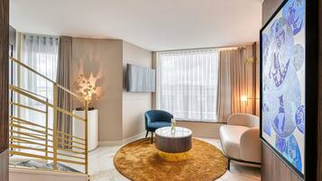 Suite junior, 1 cama matrimonial | Ropa de cama de alta calidad y caja de seguridad en la habitación