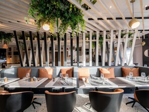 Breakfast, lunch, dinner served; Modern European cuisine, garden views 