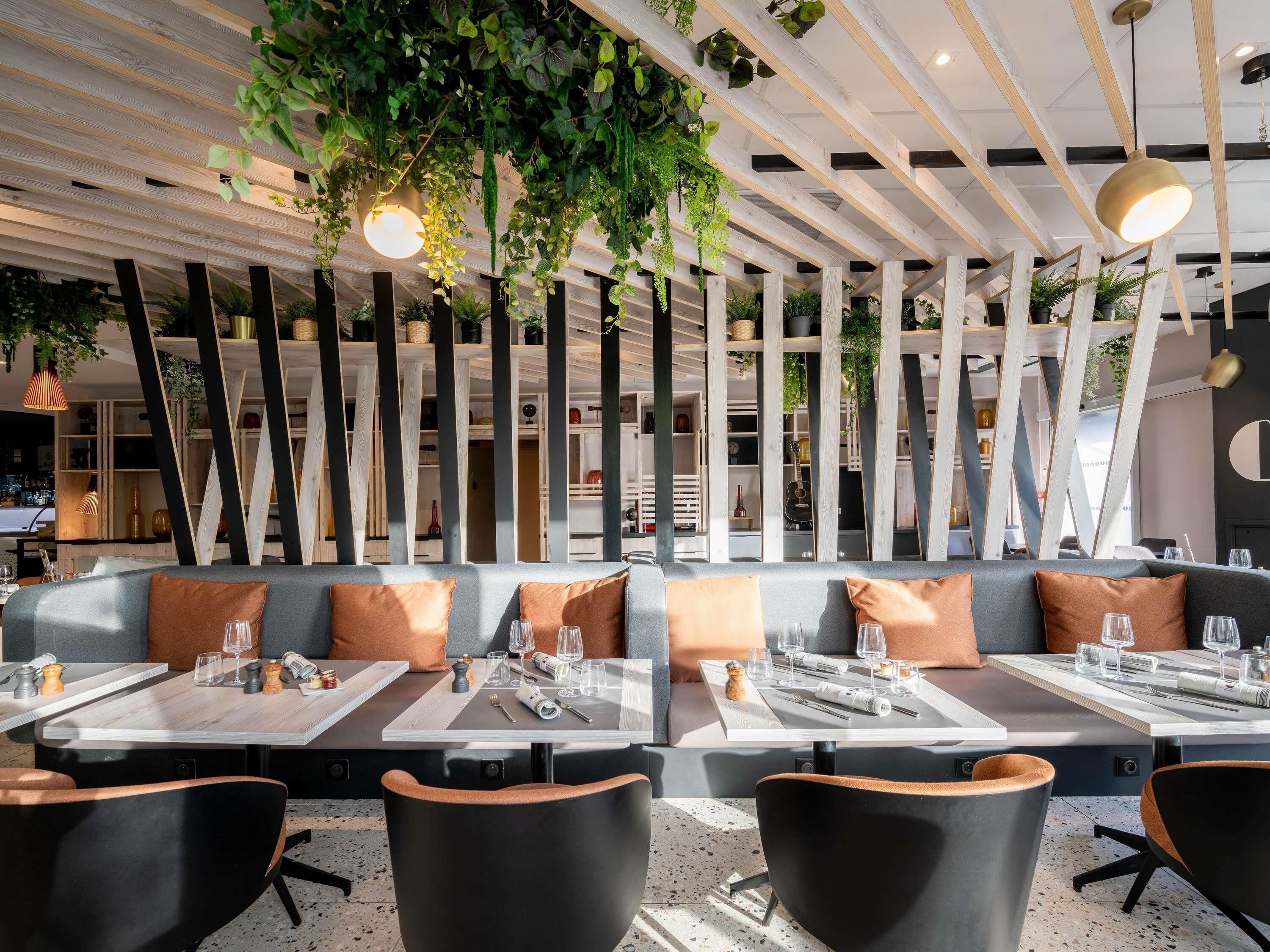 Breakfast, lunch, dinner served; Modern European cuisine, garden views 