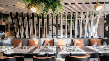 Breakfast, lunch, dinner served; Modern European cuisine, garden views