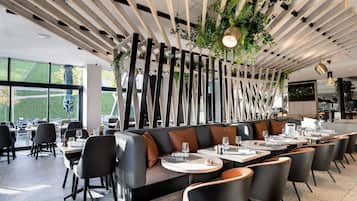 Breakfast, lunch, dinner served; Modern European cuisine, garden views