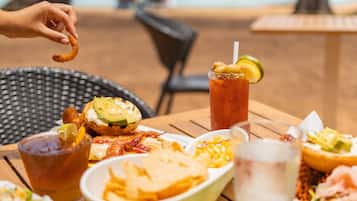 Breakfast, lunch, dinner served; local cuisine, beach views