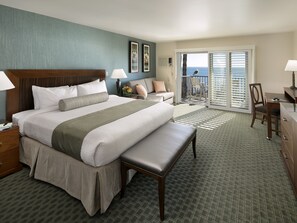 King Bed Partial Ocean and Pool View | In-room safe, desk, blackout curtains, iron/ironing board