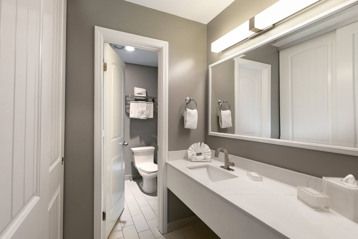 combined shower/bathtub, eco-friendly toiletries, bathrobes, towels