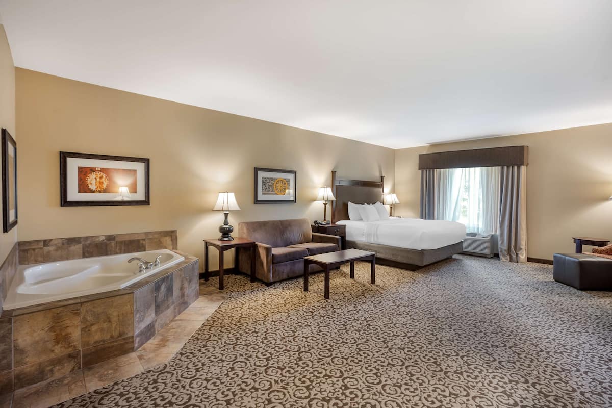Premium bedding, desk, laptop workspace, blackout curtains